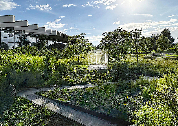 Ein Foto des Volksparks Potsdam mit dem Gebäude der Biosphäre Potsdam im Hintergrund und dem Stellplatz des Grünen Ateliers im Vordergrund